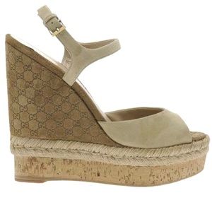 Gucci espadrilles/wedges. Gucci logo on wedge.